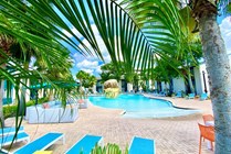 Grab a seat by our resort-style swimming pool!
